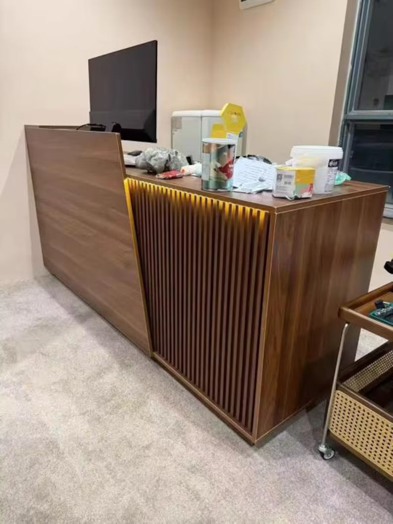 ZheeLigna – Custom Walnut Reception Desk with Slatted Front Design