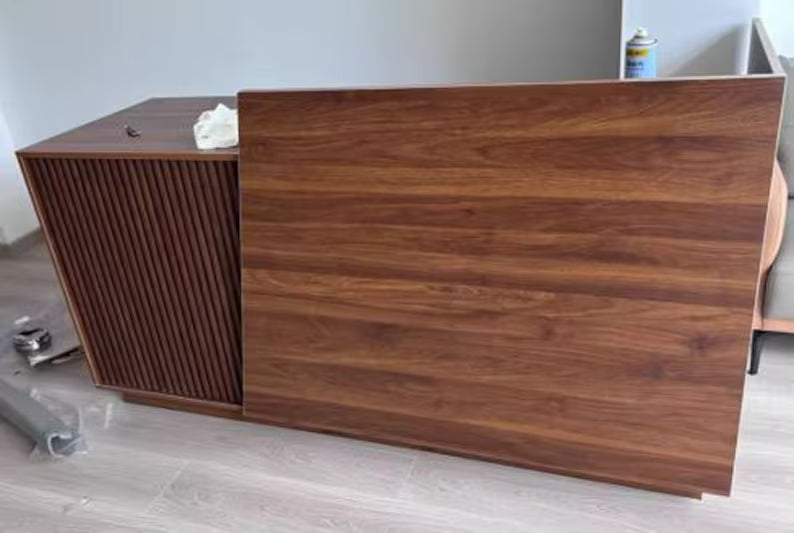 ZheeLigna – Custom Walnut Reception Desk with Slatted Front Design